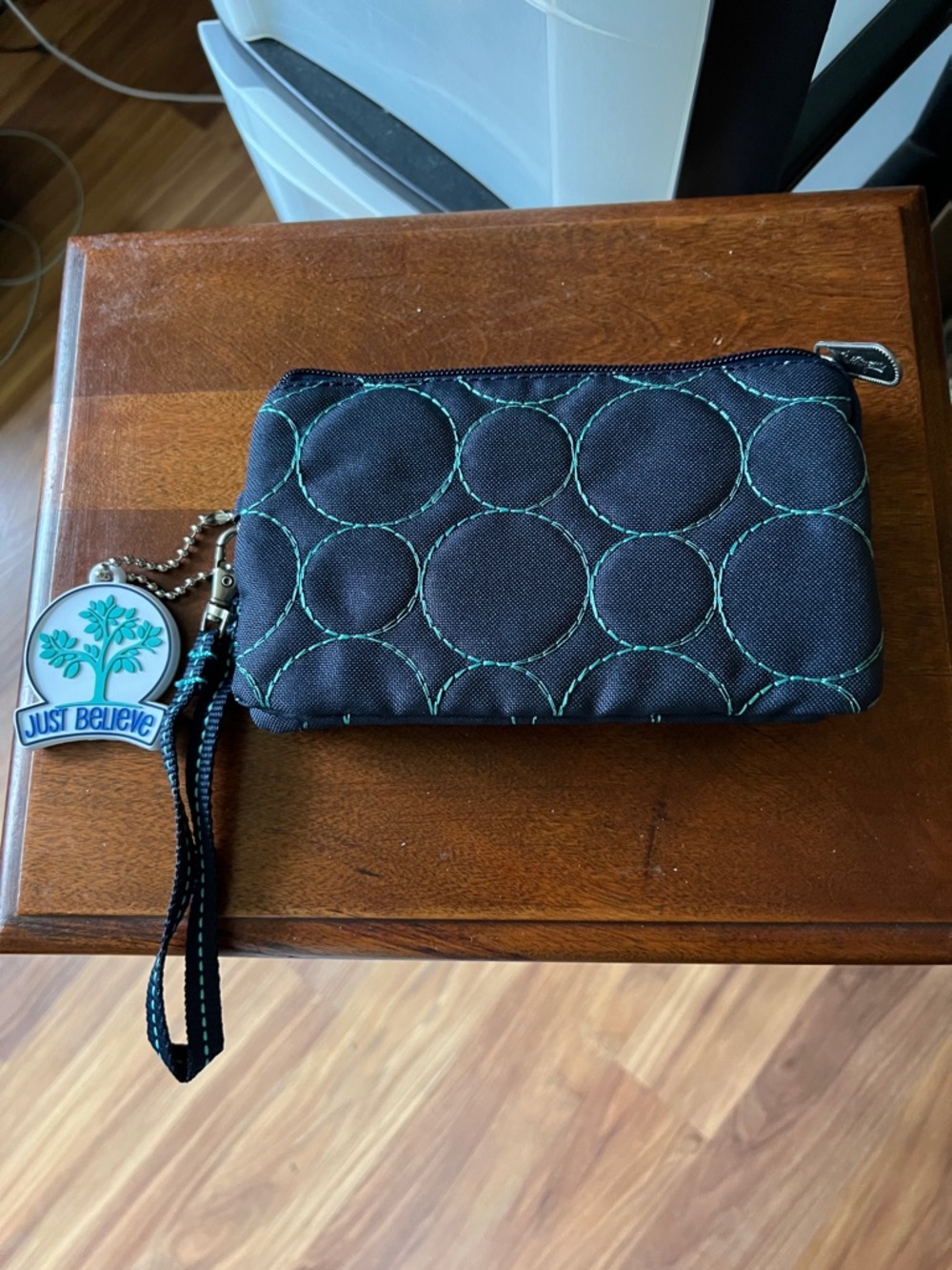 thirty-one “Vary You” Black Wristlet with Teal Circle Stitching and Charm
